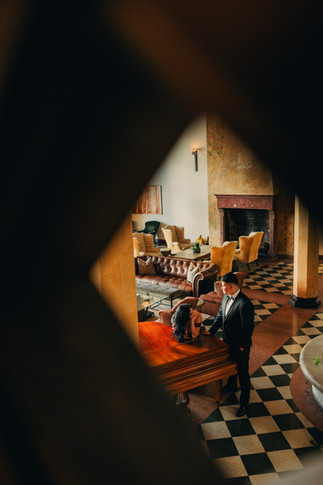 cinematic engagement photos los angeles luxury lounge interior couple