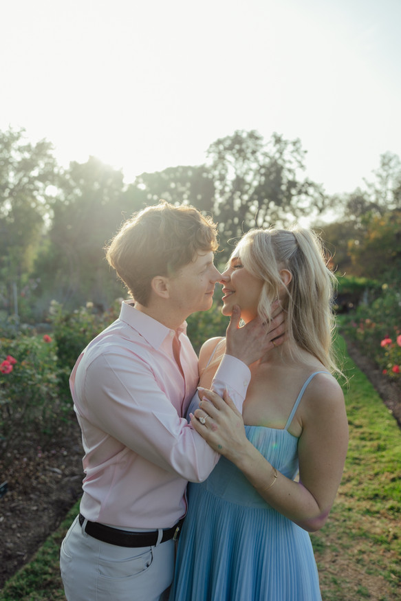 romantic close up engagement portrait huntington library rose garden pasadena golden light