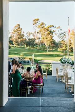 Guests gathered on the terrace overlooking the greens at Marbella Country Club