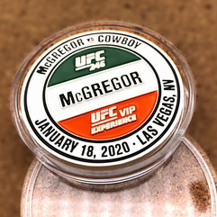 UFC 247 and UFC 246 challenge coins featuring Shevchenko, Jones, McGregor, and Cowboy