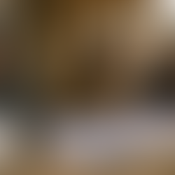 Three construction business partners reviewing plans, with one man excluded from the discussion, illustrating minority shareholder conflict