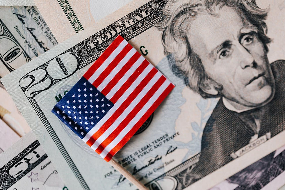 US flag over dollars