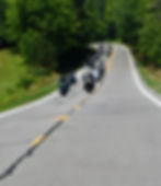 Motorcyclists riding in a Shreds For Autism charity event.