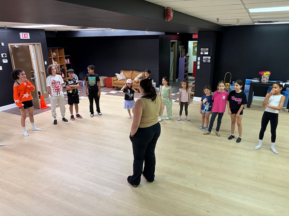 Students participating in a musical theatre camp.