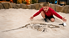 Child discovering fossils in museum play area.png