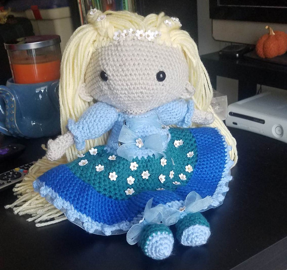 A crochet plushie made by Charlotte Ward, founder and owner of Purple Llama Crochet