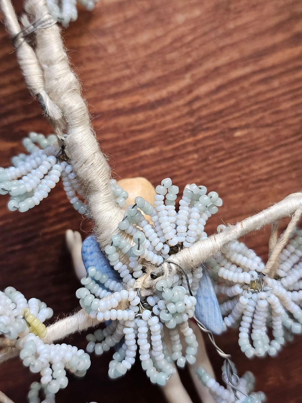 Thumbnail: Antique funeral wreath in glass beads with bisque angel - small