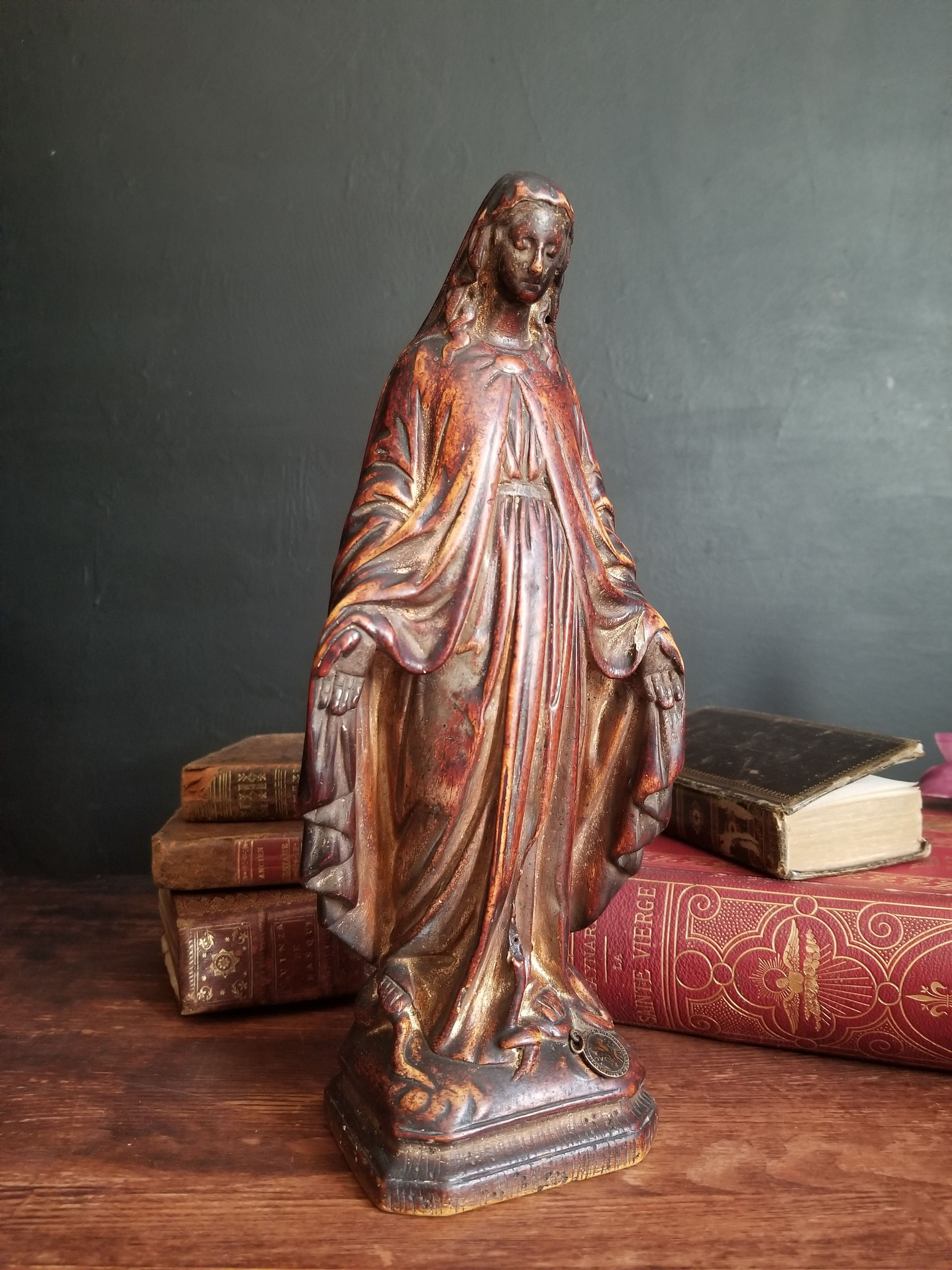 Antique Our Lady of Grace painted chalkware statue with St Benedict medal. distressed look