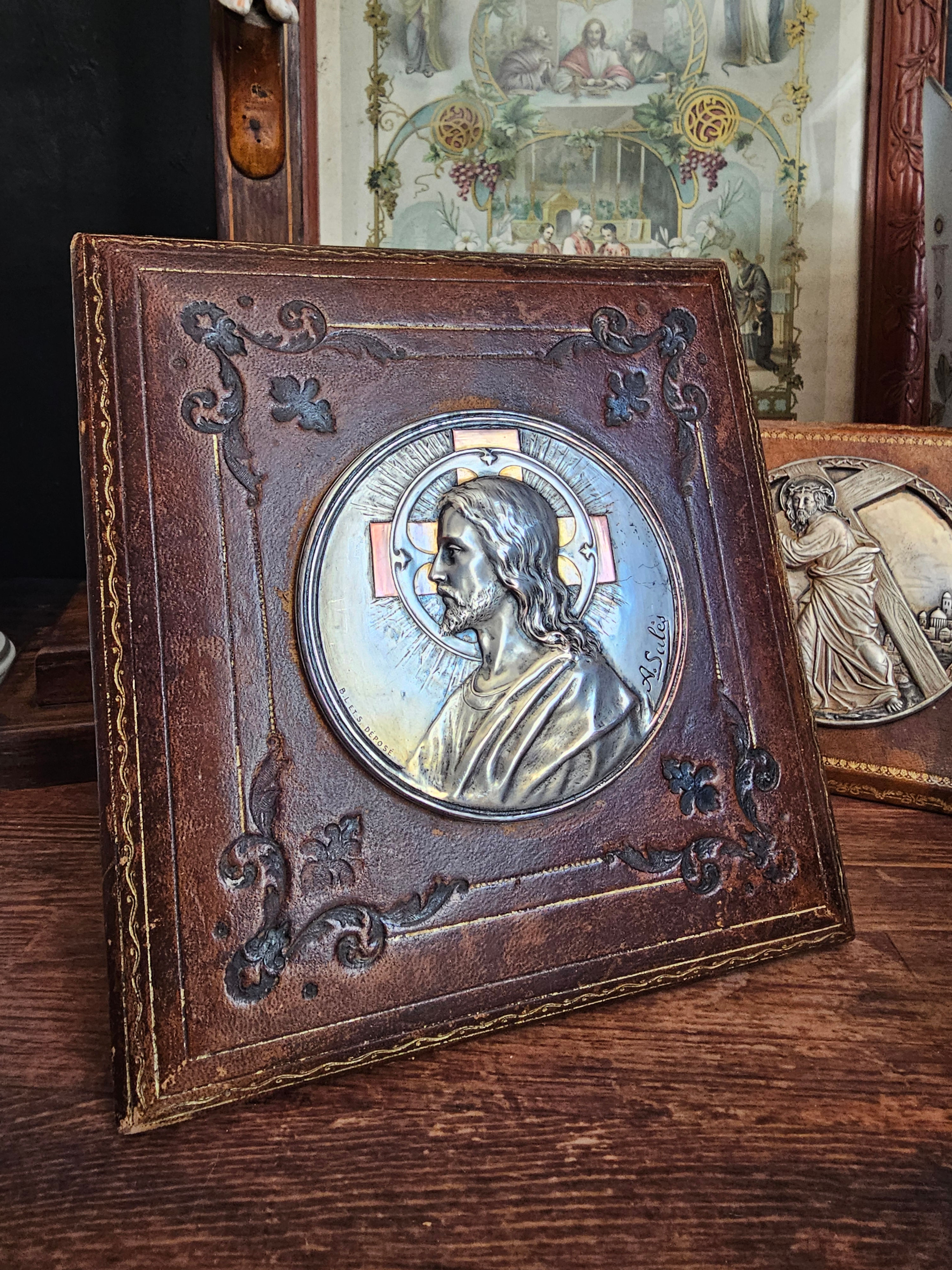 French antique portrait of Christ signed A Salès in metal on leather plaque