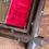 Thumbnail: French antique crucifix on red  velvet in frame with ivy leaves and thorns