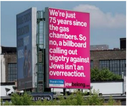 Bright pink billboards with 'bold slogans' fighting rising antisemitism in Toronto