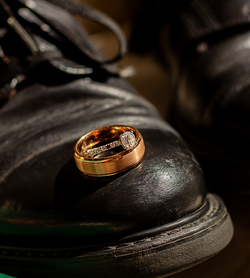 Logan, Utah wedding photographer. Close up of wedding rings on grooms shoe
