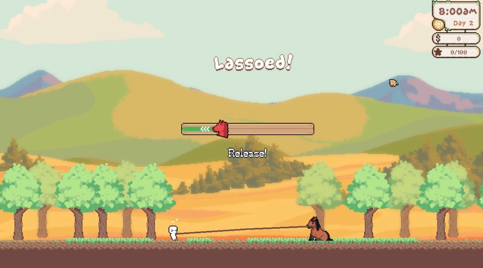 Player using a lasso in Canter Cove gaemplay with rolling hills and a cozy countryside landscape