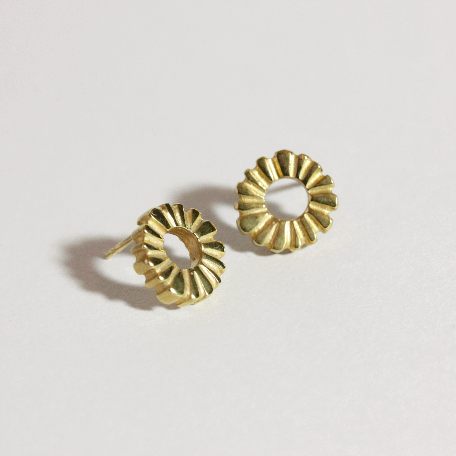 fossil charm studs in gold plated silver