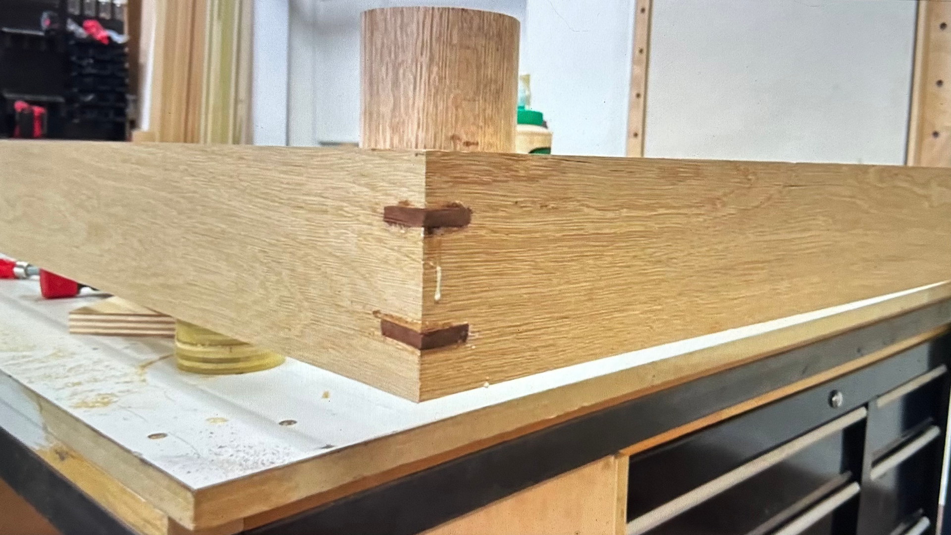 Close-up of the wooden spline joing two pieces of wood together.