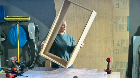 woman transporting a wooden box