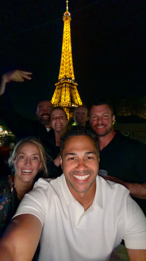 The Eiffel Tower by night with friends