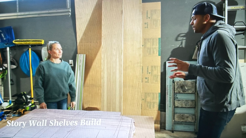 Man and woman discussing plans in a garage