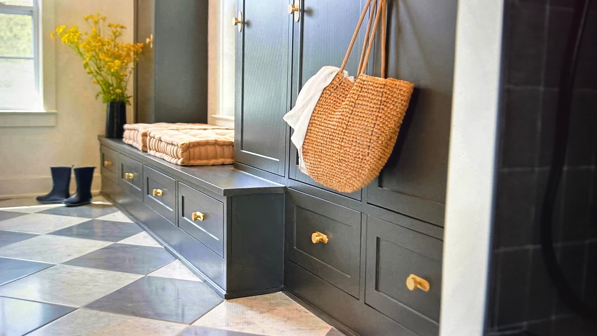 modern updated mudroom with lockers and marble tile flooring