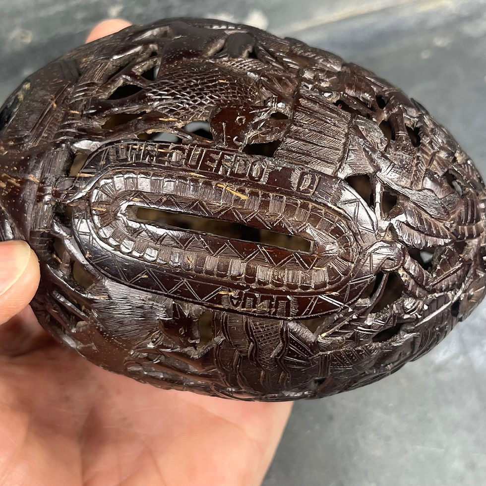 Thumbnail: Carved coconut piggy bank – “Un recuerdo de Ucua” folk art