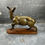 Thumbnail: Animal bronze – Doe on wooden base – Hidden secret hiding place