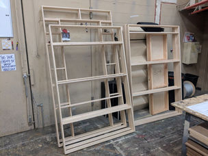 Pride and Prejudice, Part Two Process Photo (04)
A process photo from the construction of the "Flat B, C, E, and F" set pieces. This photo features the completed lumber frames for several flats.
Photo credits: Wesley Carney