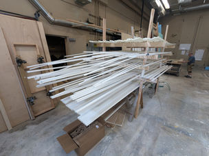 Pride and Prejudice, Part Two Process Photo (10)
A process photo from this show's set build. This photo features many sticks of moulding after they were laid out and sprayed with a base coat of paint.
Photo credits: Wesley Carney