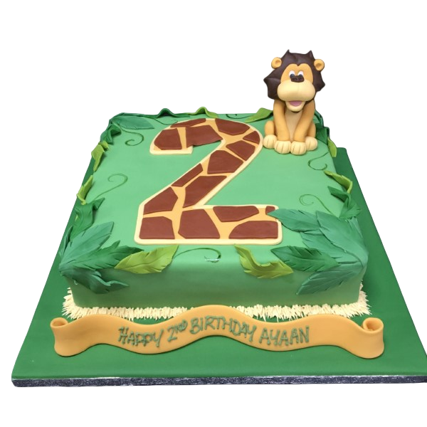 A whimsical lion-themed birthday cake with a number two topper set against a charming giraffe print background. Perfect for a fun and memorable celebration!