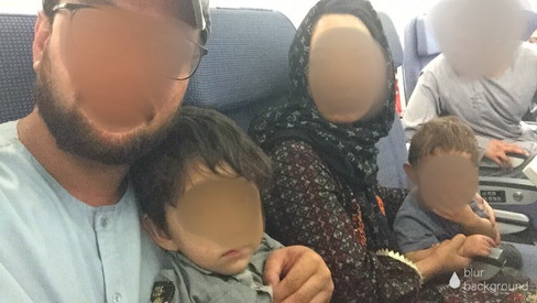 Refugees on a plane.jpeg