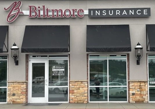 Biltmore Insurance building exterior with black awnings
