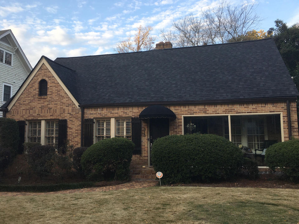 New black asphalt roof by Premiere Roofing
