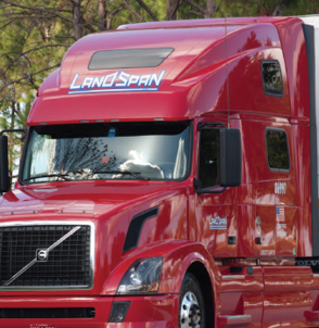 Red Volvo semi-truck with Landspan logo