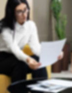 full-shot-business-woman-holding-documents.jpg