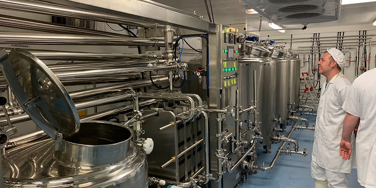 Stainless steel dairy equipment ensuring hygiene in production.