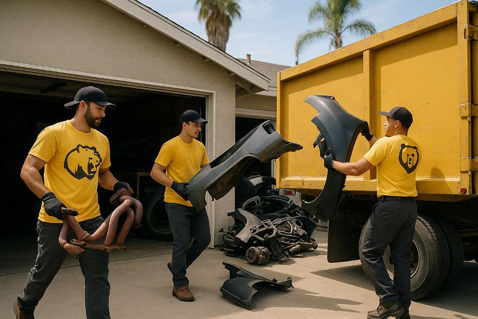Golden Bear Hauling team removing car parts from a home garage in Los Angeles.