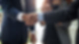 Financial advisor shaking hands with DMI leadership, representing career opportunities with a trusted Texas-based wealth management and insurance agency