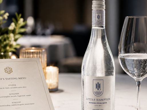 Little Hampton Sparkling Spring Water served with a chef's tasting menu in a premium fine dining restaurant.