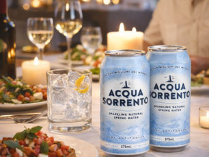 Australian sparkling water served at a relaxed outdoor dining table with food and glassware