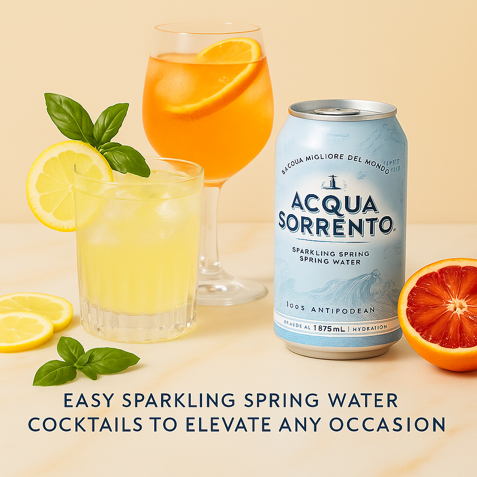 Acqua Sorrento sparkling spring water can with citrus cocktails, lemon slices, basil and blood orange on a light background, showcasing sparkling spring water cocktails.
