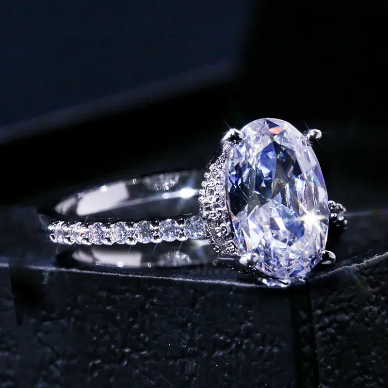 Thumbnail: Huitan Oval Finger Ring Band Dazzling Brilliant CZ Stone