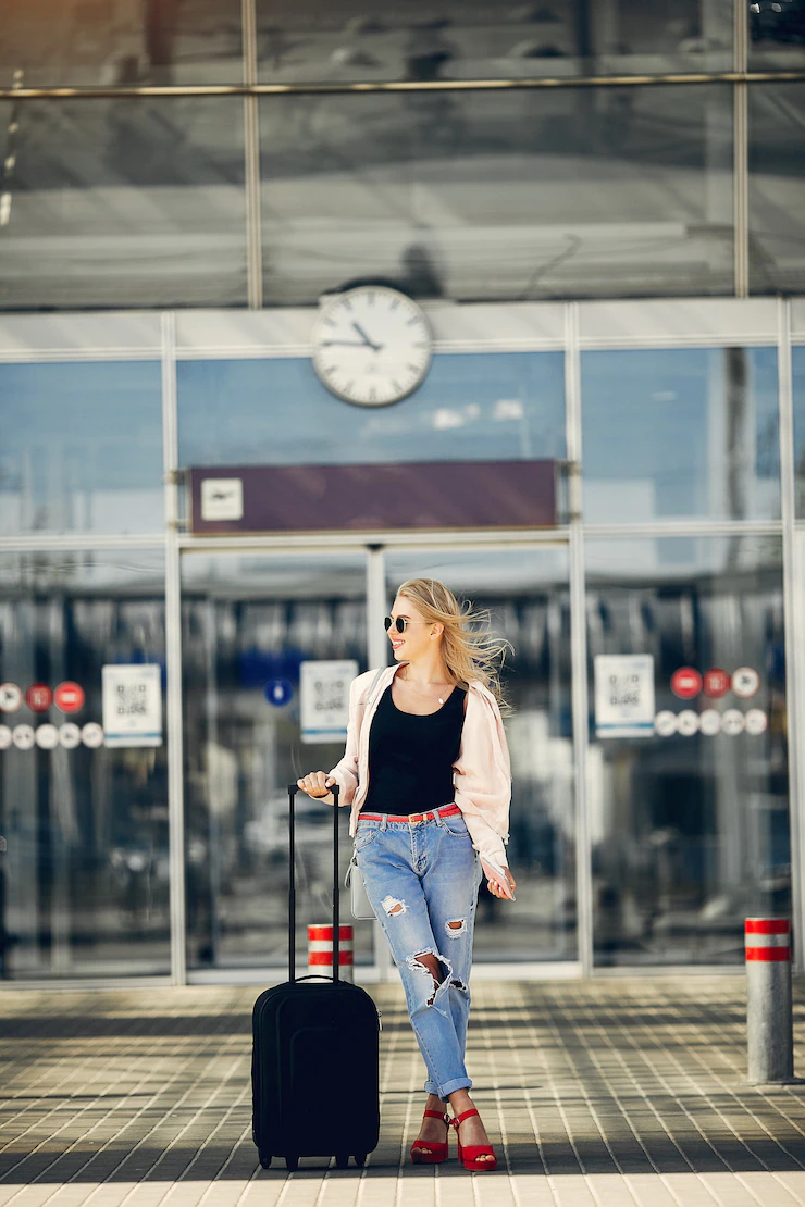 beautiful-girl-standing-airport_1157-22049.webp