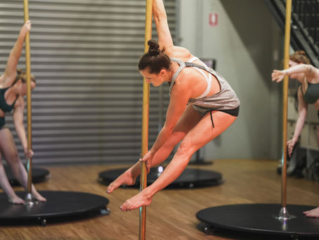 A dynamic group of pole dancers