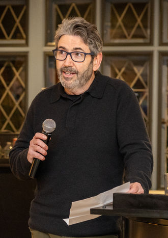 Corporate speaker event photography in Westchester NY with business presenter at company event