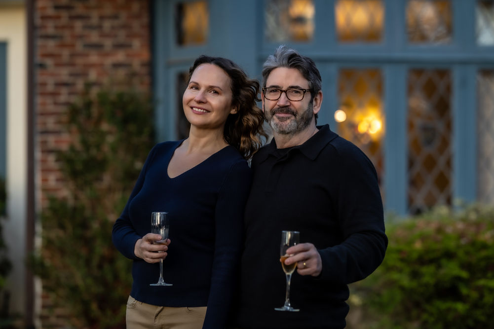 Couple posing together outdoors during a lifestyle couples photography session in Westchester New York