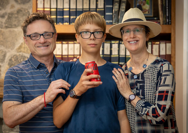 Family posing together indoors during a lifestyle family photography session in Westchester New York