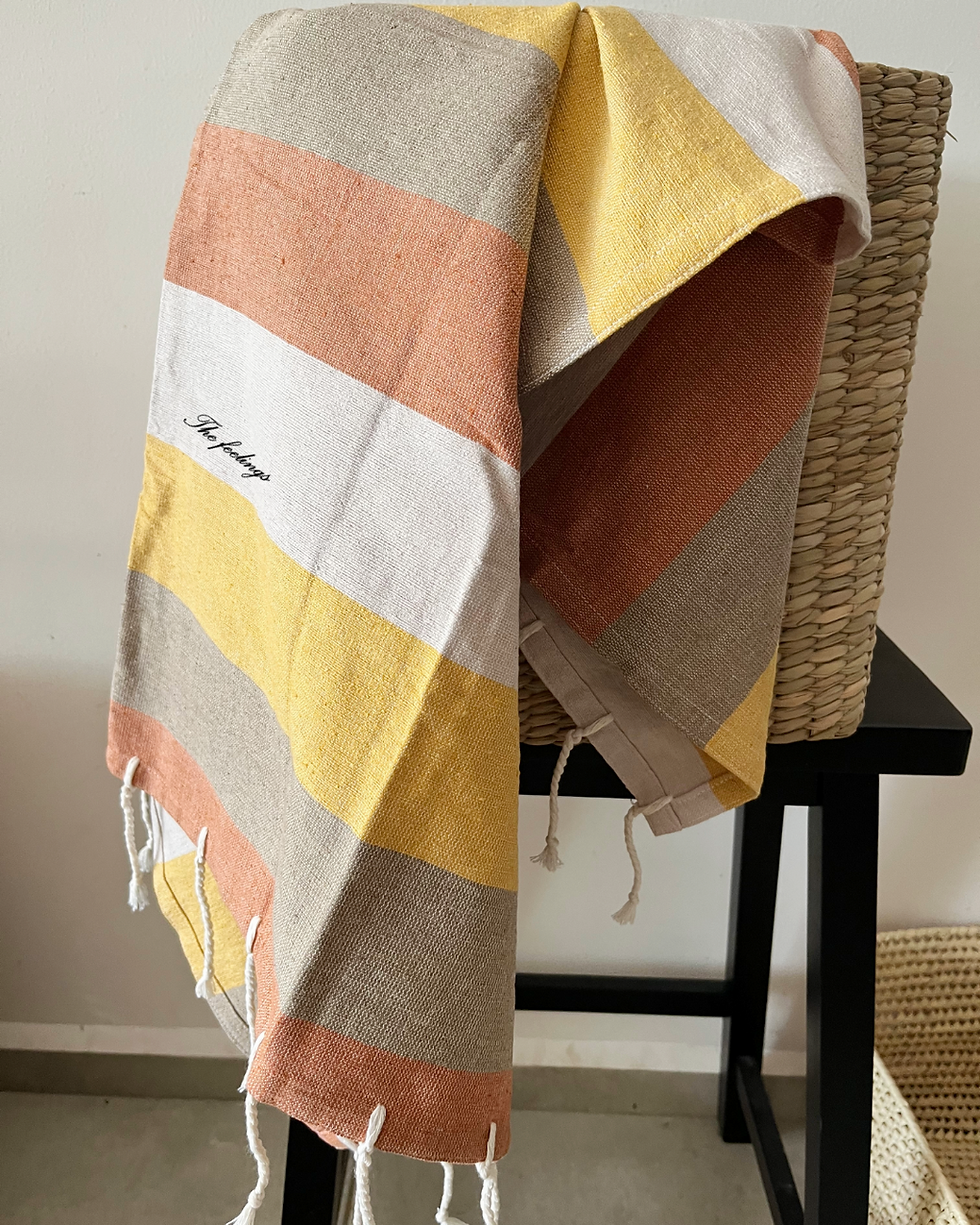 manta de playa en tonos tierra hecha de algodon