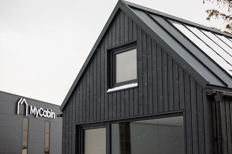 MyCabin home with MyCabin factory in the background