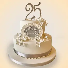 Elegantly decorated anniversary cake with celebratory accents.