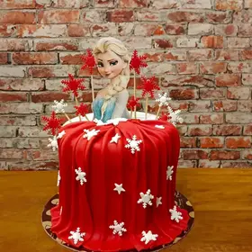 Delicate and beautifully decorated cake designed for her special occasion.