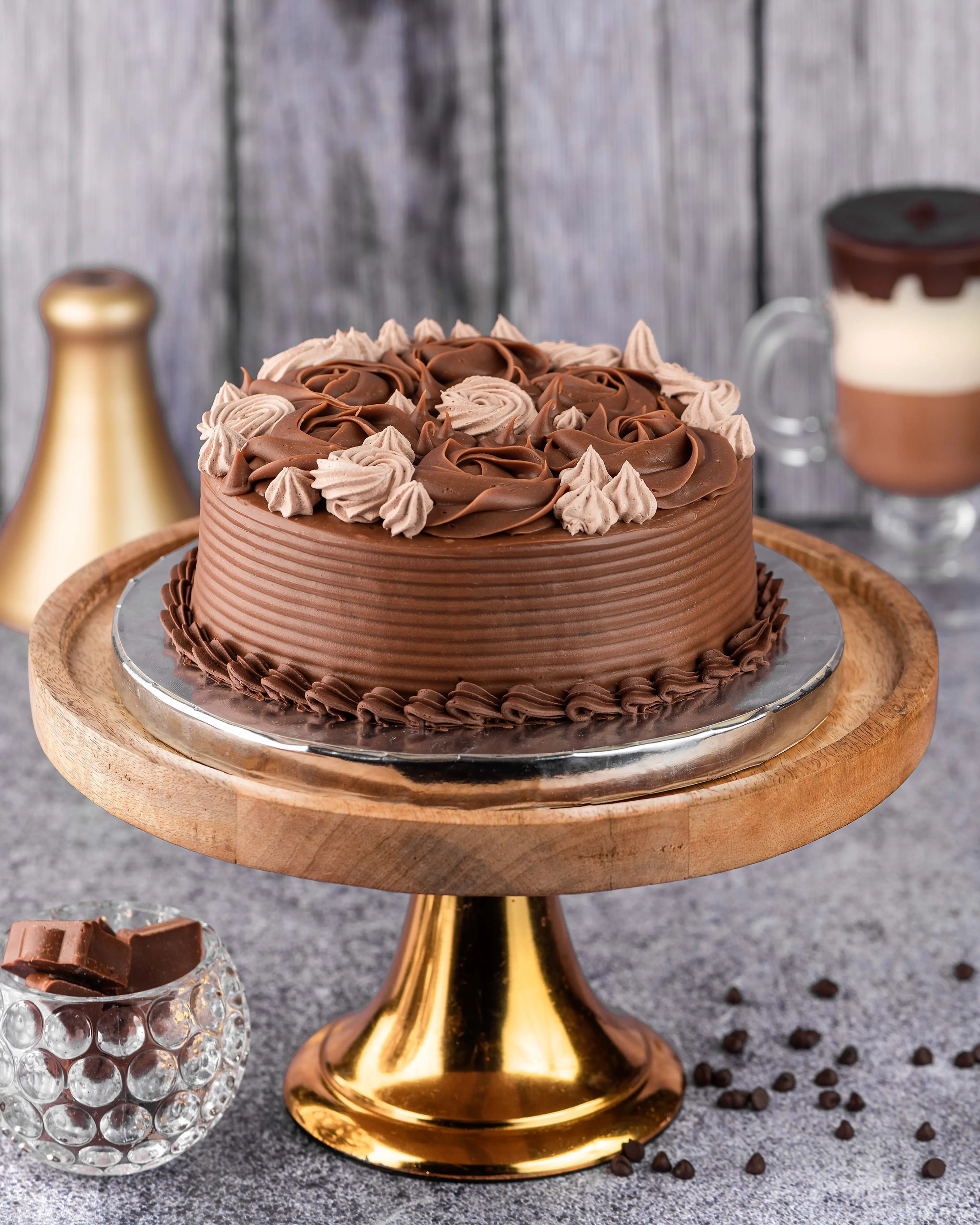 Decadent chocolate truffle cake from 7th Heaven, topped with chocolate curls and cocoa dust
